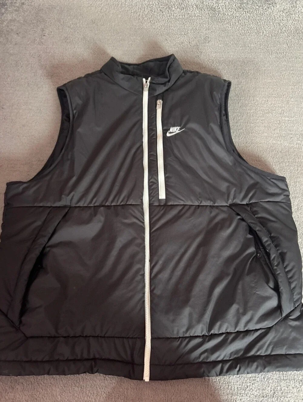 Nike Black Puffer Vest with White Logo Tag